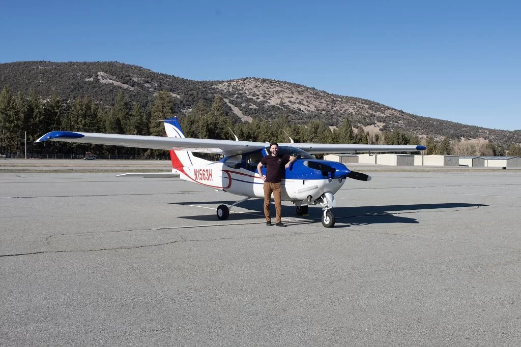 FLIGHT TRAINING 4 General aviation airplane at Big Bear City Airport in mountain terrain