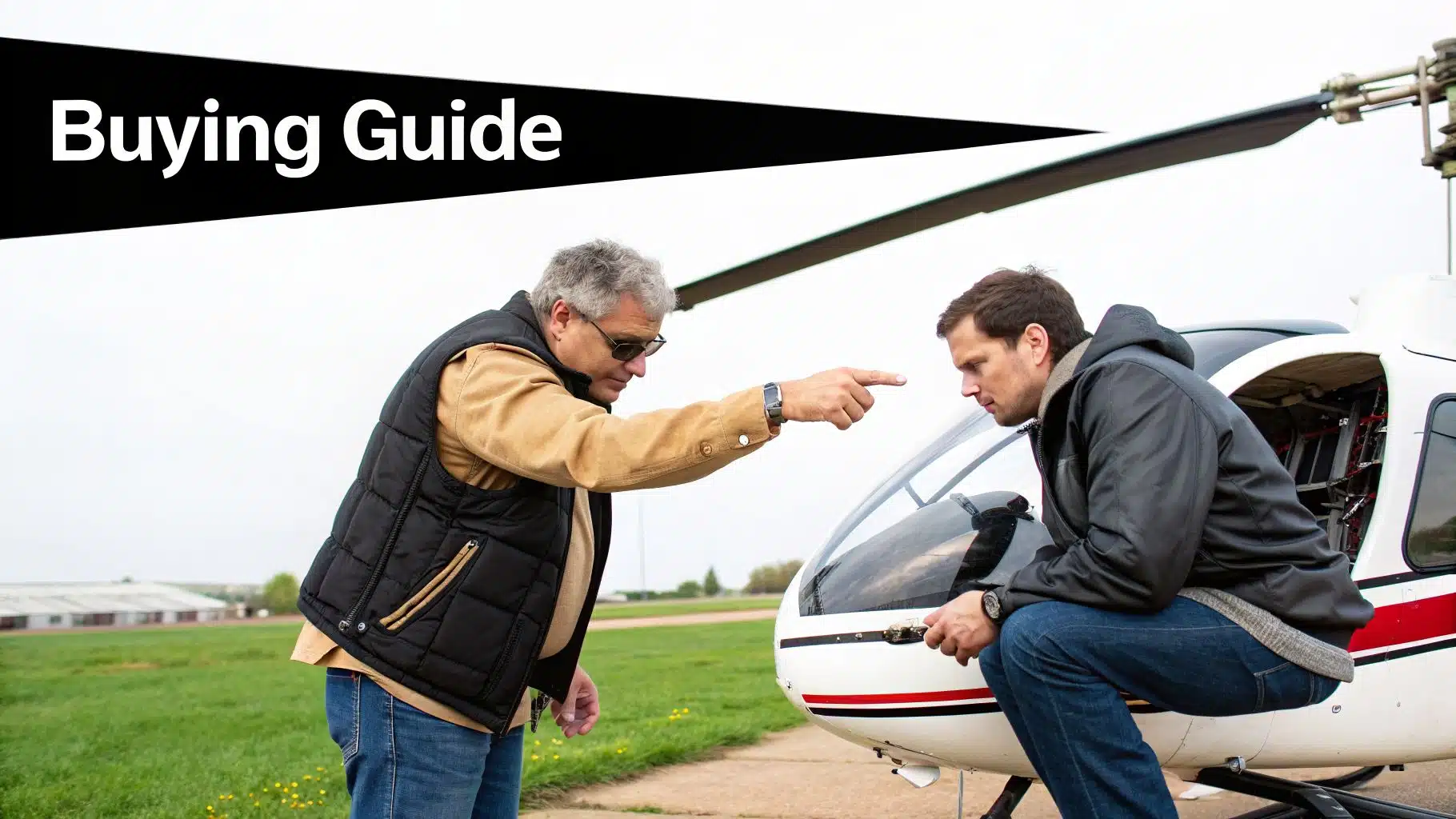 Your Guide to a Helicopter Discovery Flight Near Me 5 Two men inspecting a white helicopter, one pointing while discussing it with the other.