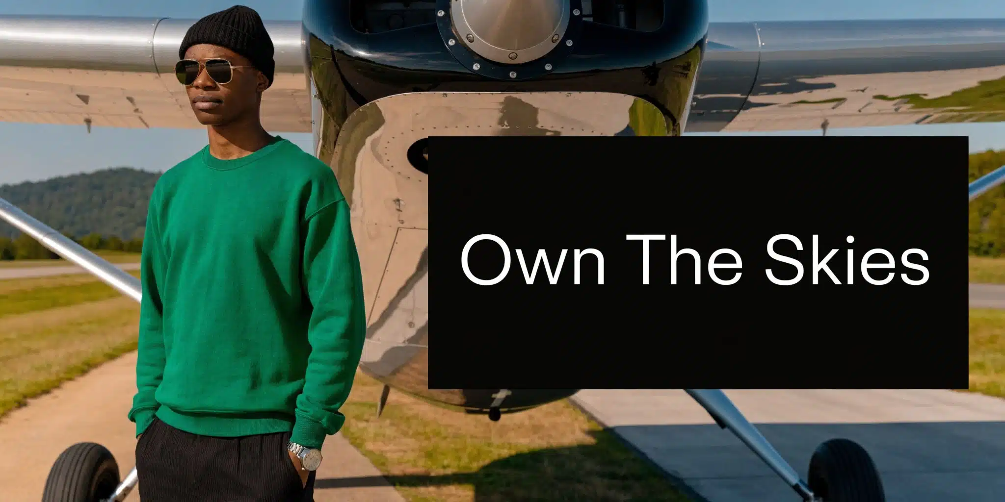 Flying Small Plane: Your 2026 Roadmap to the Sky 5 A stylish man wearing a green sweatshirt and beanie standing next to a small private airplane.