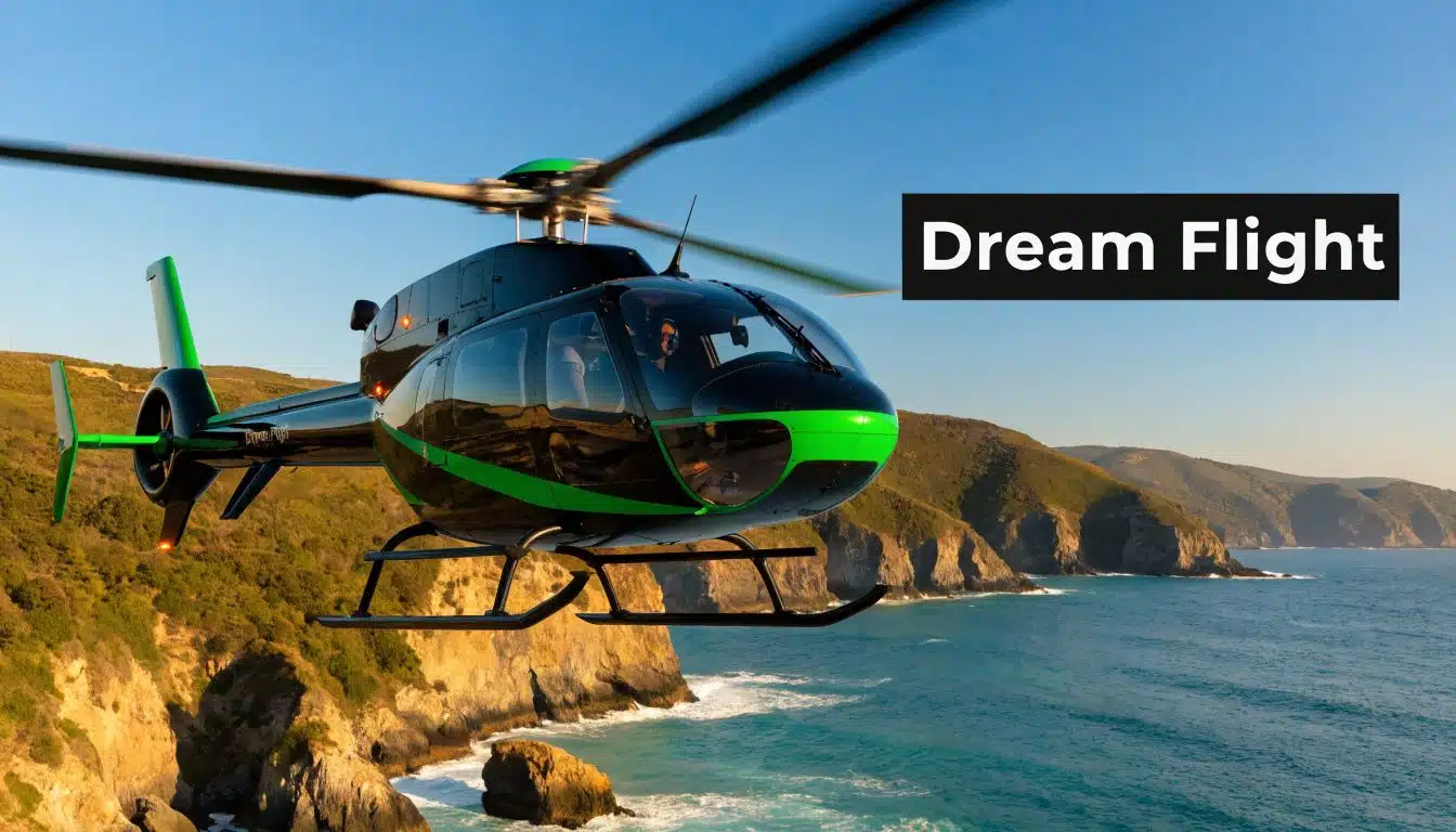 Helicopter Training California: Your 2026 Pilot Guide 2 A black and green helicopter flying over a scenic coastline with steep cliffs and the ocean.