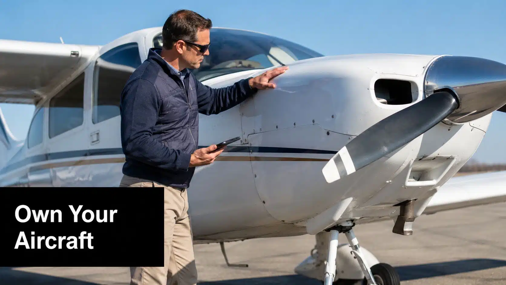 Pilot Jobs in Texas: Your 2026 Career Guide 4 A pilot wearing sunglasses inspects a small private airplane while holding a tablet on an airfield.
